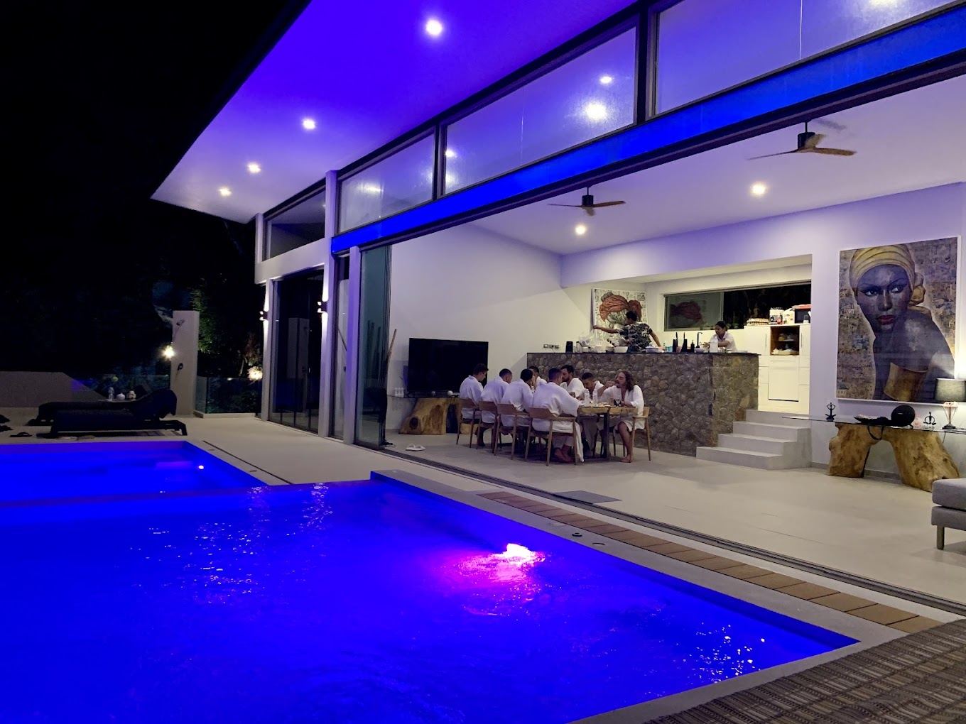 Private chef dinner by Villa 369 illuminated pool at night, luxury dining Koh Samui